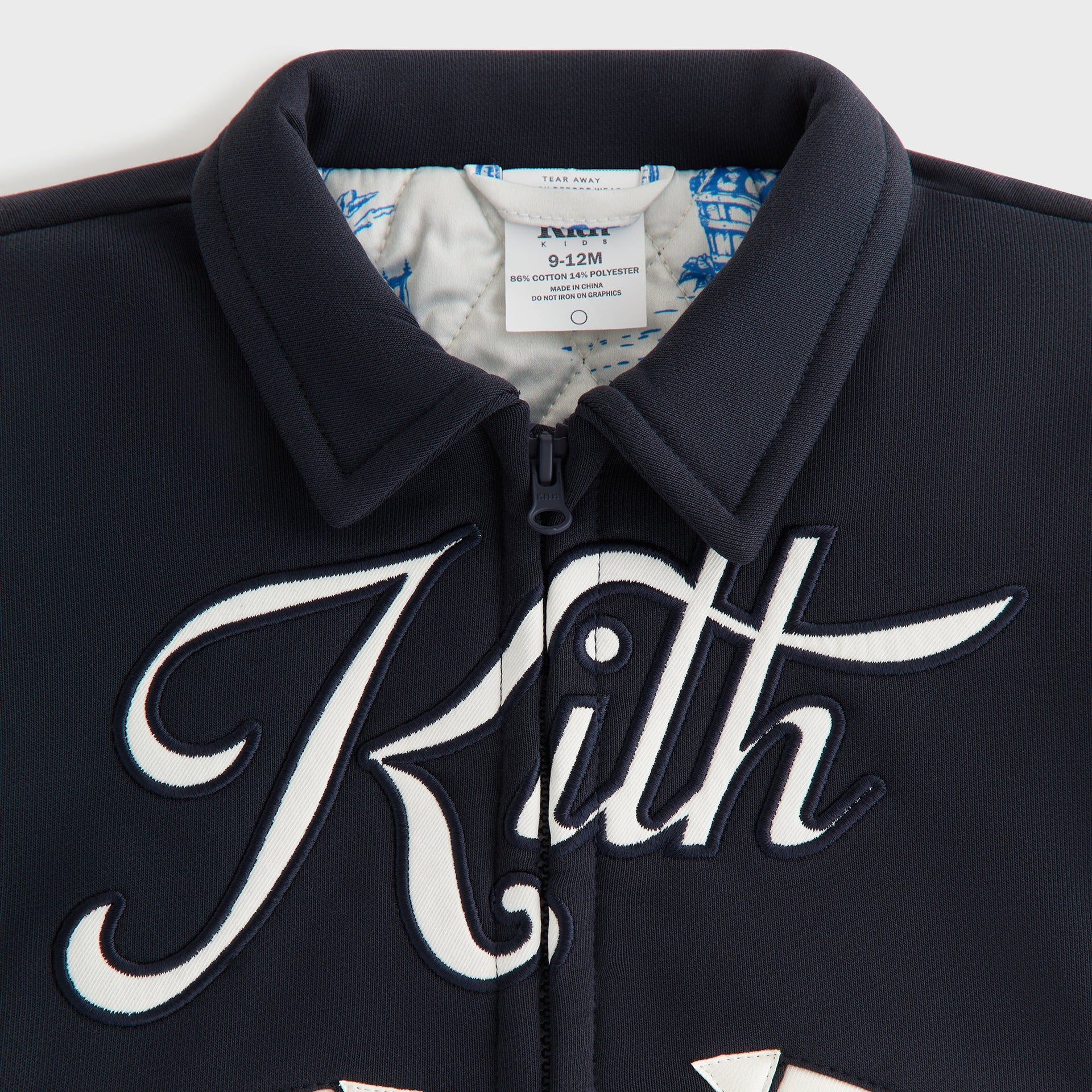 Kith Baby NY to The World Varsity Jacket - Ink