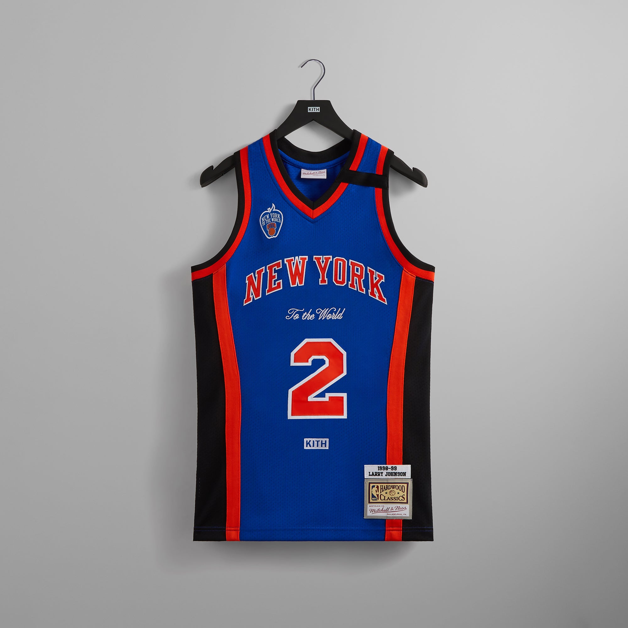 Kith and Mitchell & Ness for the New York Knicks Larry Johnson Jersey - Knicks Blue / Knicks Orange